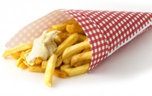 Printed grease resistant paper packaging of fish 'n' chips.