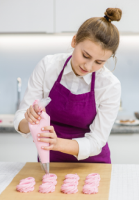 Making meringues on siliconised greaseproof paper .jpg